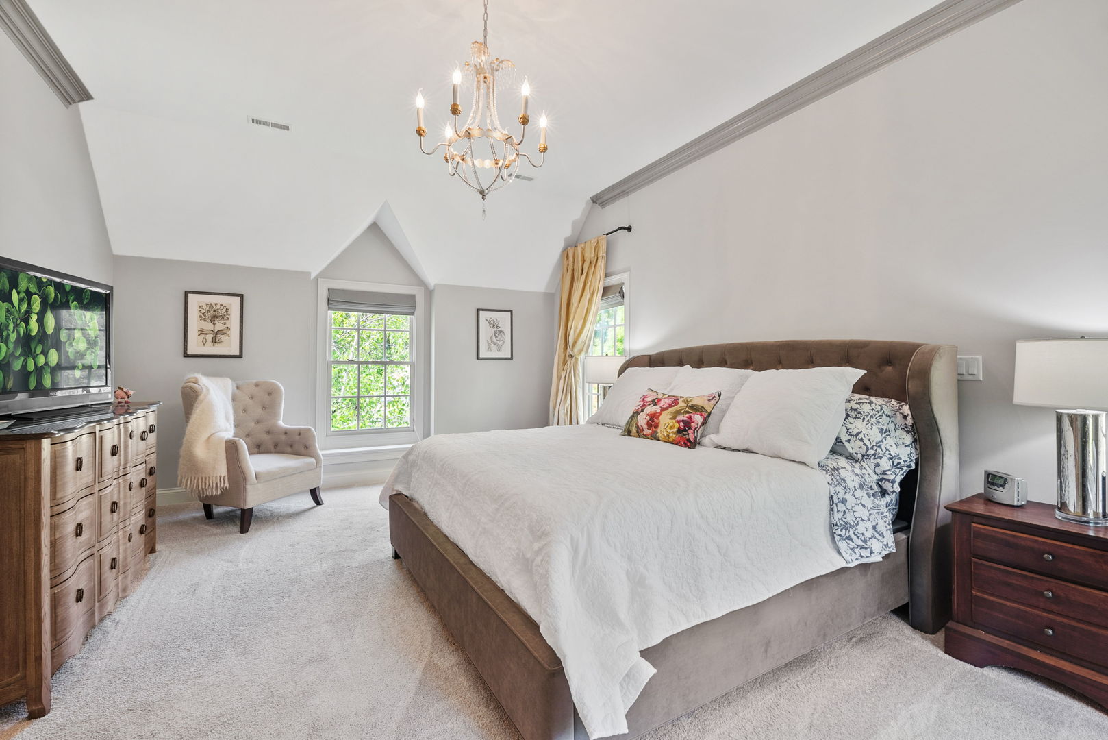 1209 Dunstan Road Geneva, IL 60134 - Photo 15 of 27 a spacious bedroom with a bed and a chandelier