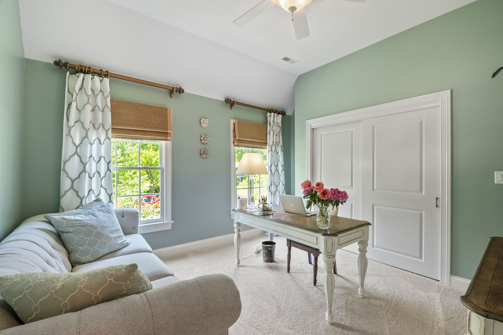 1209 Dunstan Road Geneva, IL 60134 - Photo 17 of 27 a living room with furniture and a chandelier
