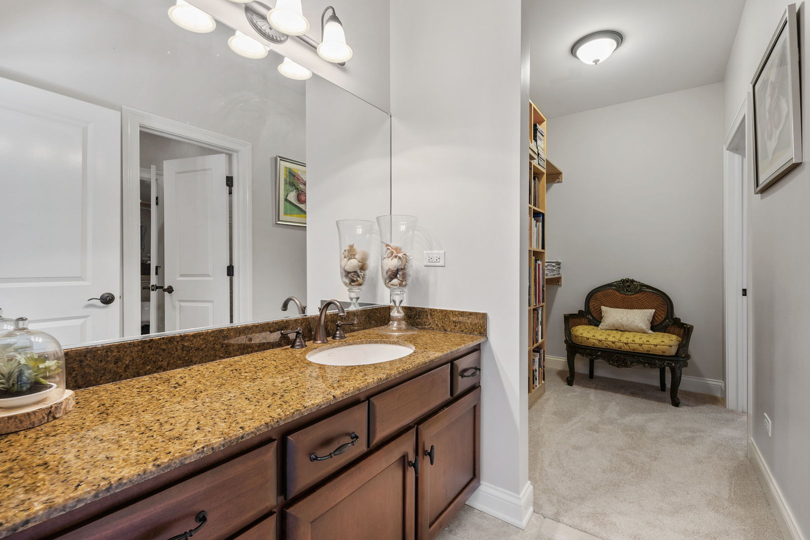 1209 Dunstan Road Geneva, IL 60134 - Photo 21 of 27 a en suite bathroom with a granite countertop sink and a mirror