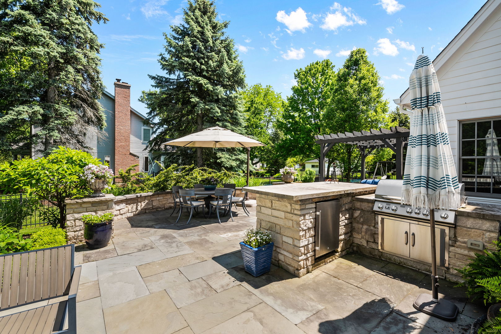 1209 Dunstan Road Geneva, IL 60134 - Photo 24 of 27 a view of outdoor sitting area with furniture and garden