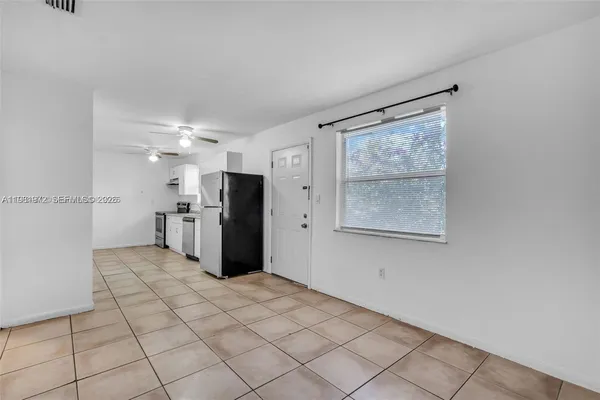 a view of an empty room with window