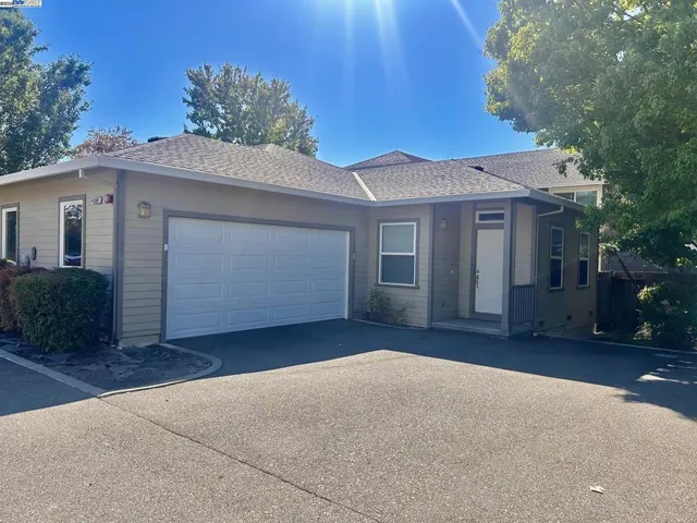 front view of a house with a garage