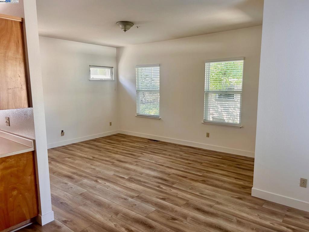 426 Piper Street Healdsburg, CA 95448 - Photo 5 of 10 a view of a room with wooden floor and windows
