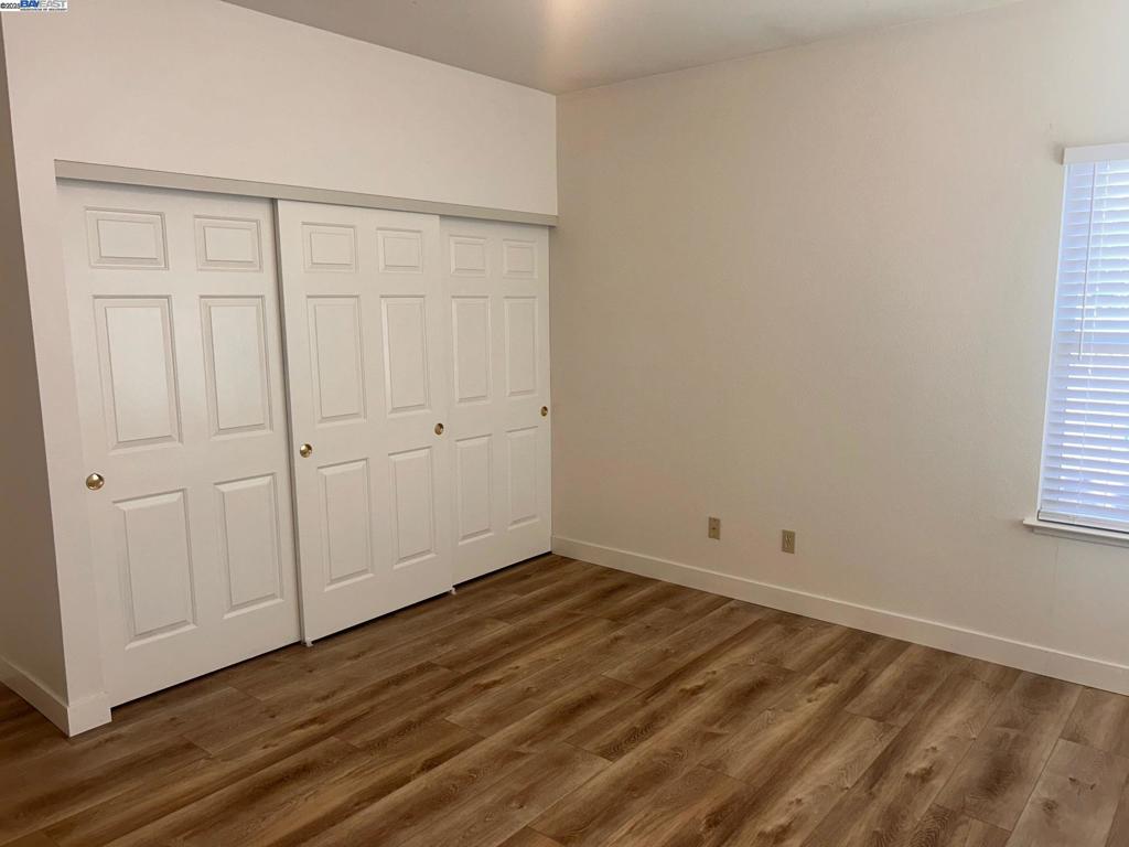 426 Piper Street Healdsburg, CA 95448 - Photo 6 of 10 a view of an empty room with wooden floor