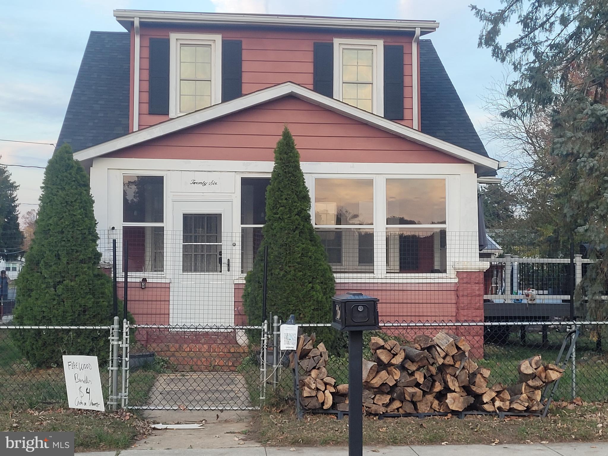 26 East Cohawkin Road Clarksboro, NJ 08020 - Photo 1 of 3 a front view of a house with garage
