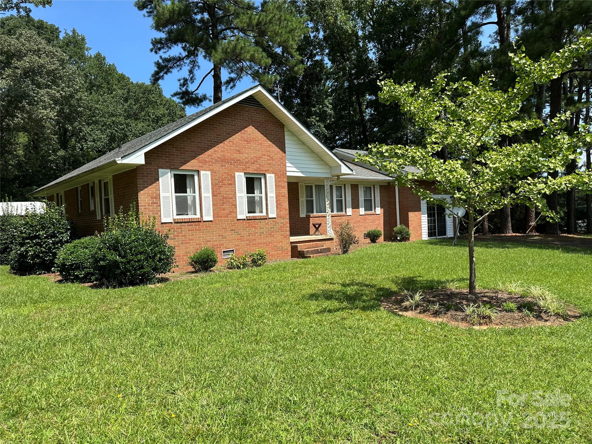 625 Teddar Road Mount Gilead, NC 27306 - Photo 2 of 25 a front view of house with yard and green space