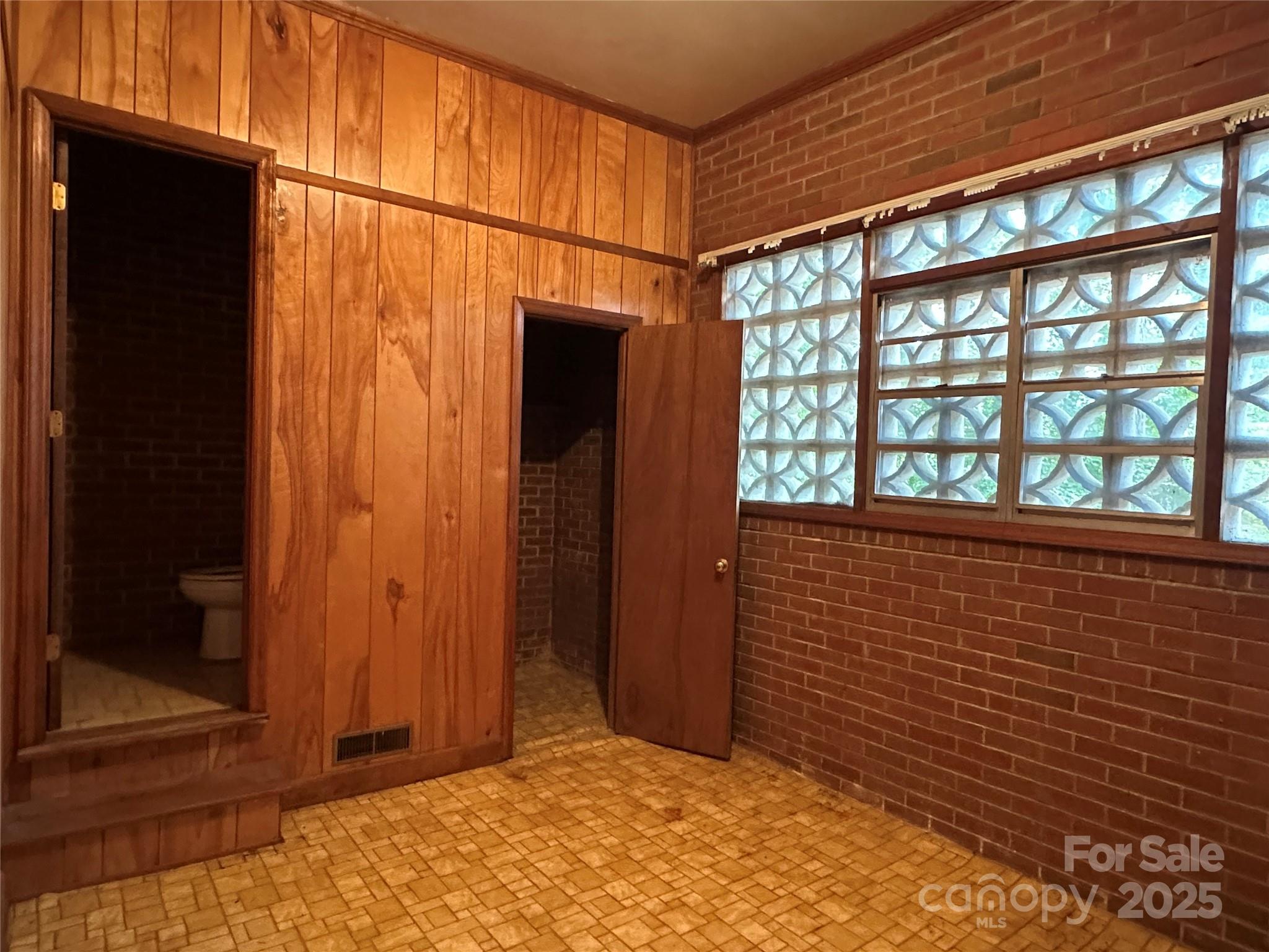 625 Teddar Road Mount Gilead, NC 27306 - Photo 23 of 25 a view of a blue door with a glass door