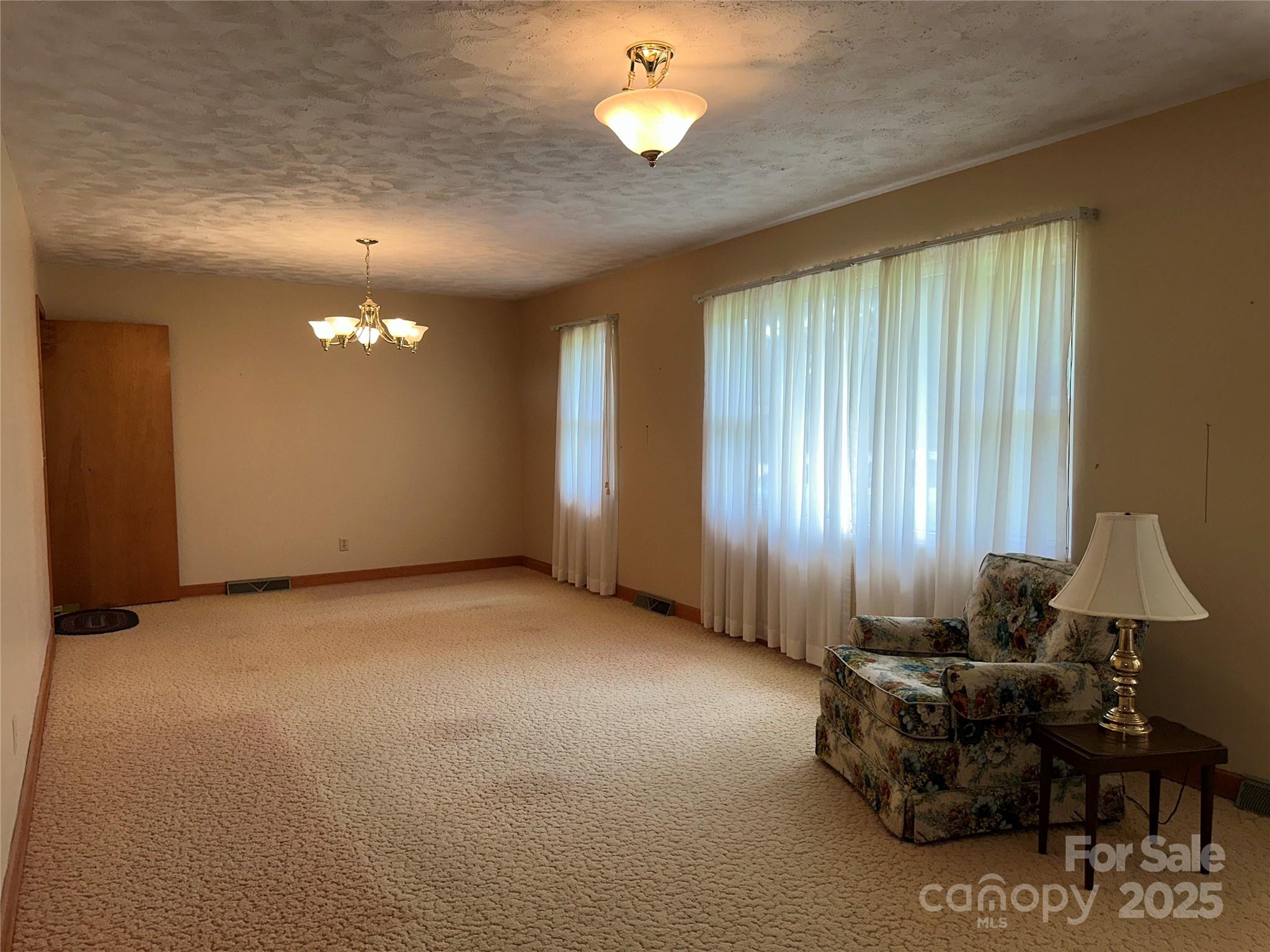 625 Teddar Road Mount Gilead, NC 27306 - Photo 10 of 25 wooden floor in an empty room with a window