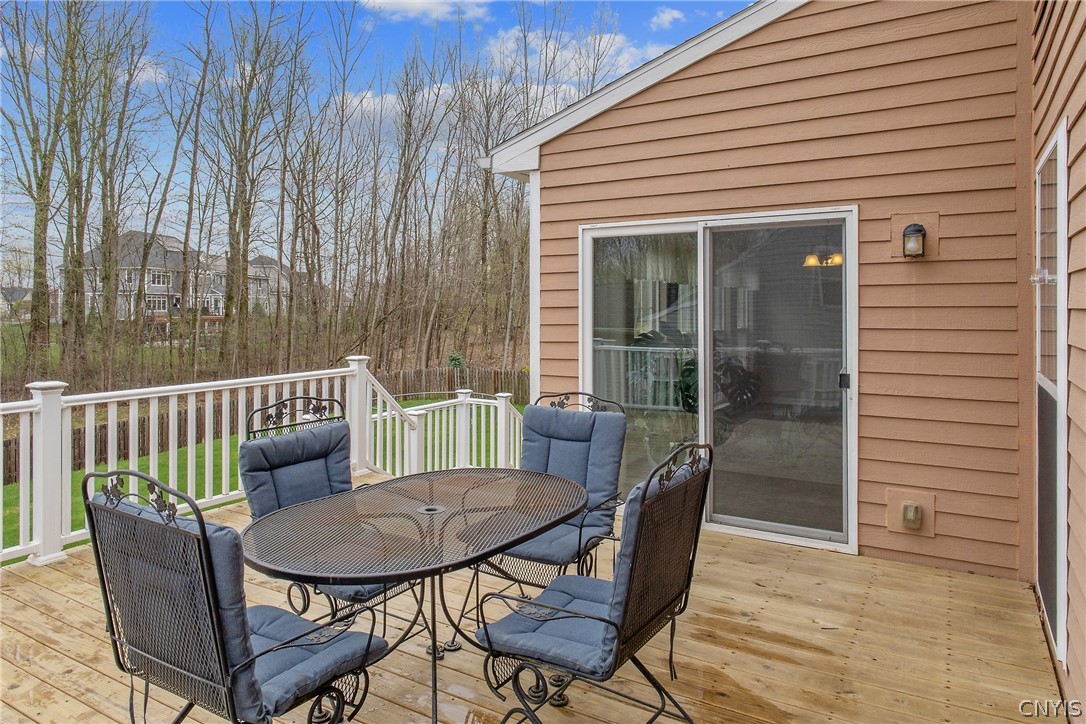 8294 Luchsinger Lane Lysander, NY 13027 - Photo 40 of 47 Wood deck built in 2020 has vinyl railing.
