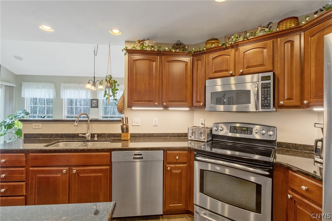8294 Luchsinger Lane Lysander, NY 13027 - Photo 9 of 47 Newer Stainless Steel appliances all included.