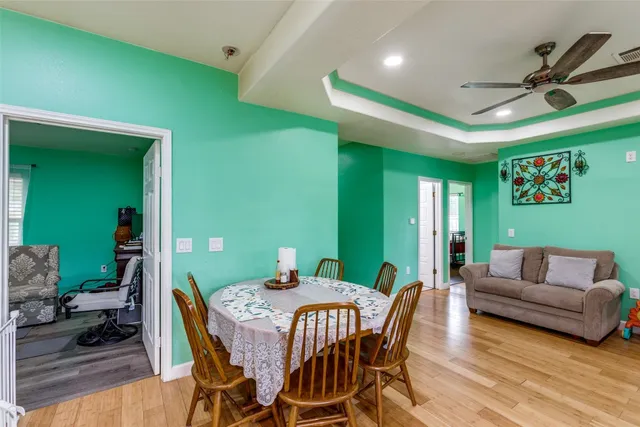 a kitchen with lots of counter top space and dining table