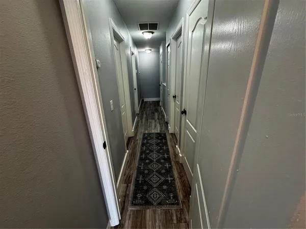 a view of hallway with stairs