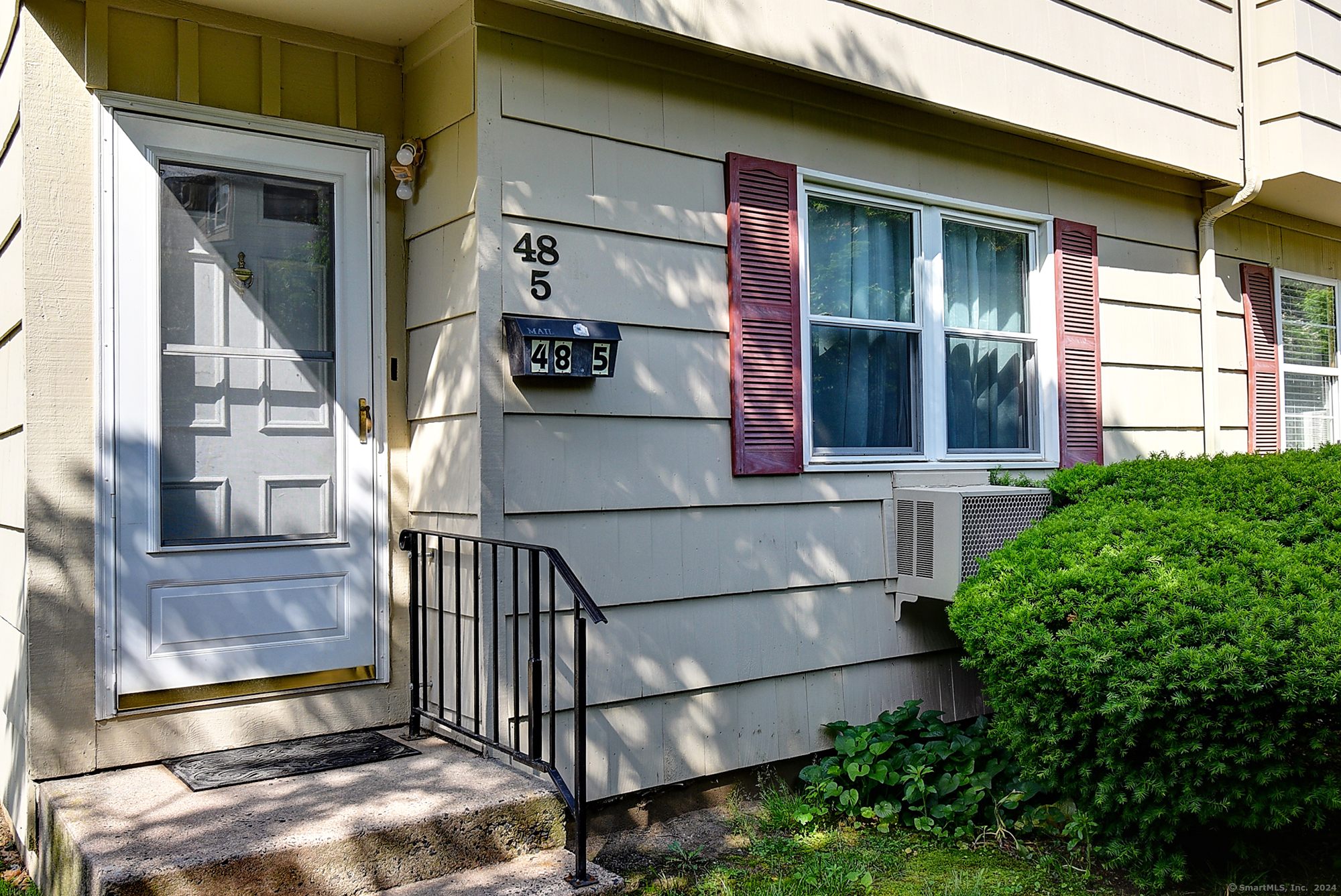 48 Round Tree Drive, Unit 5 Naugatuck, CT 06770 - Photo 1 of 1 a view of a brick house with a window