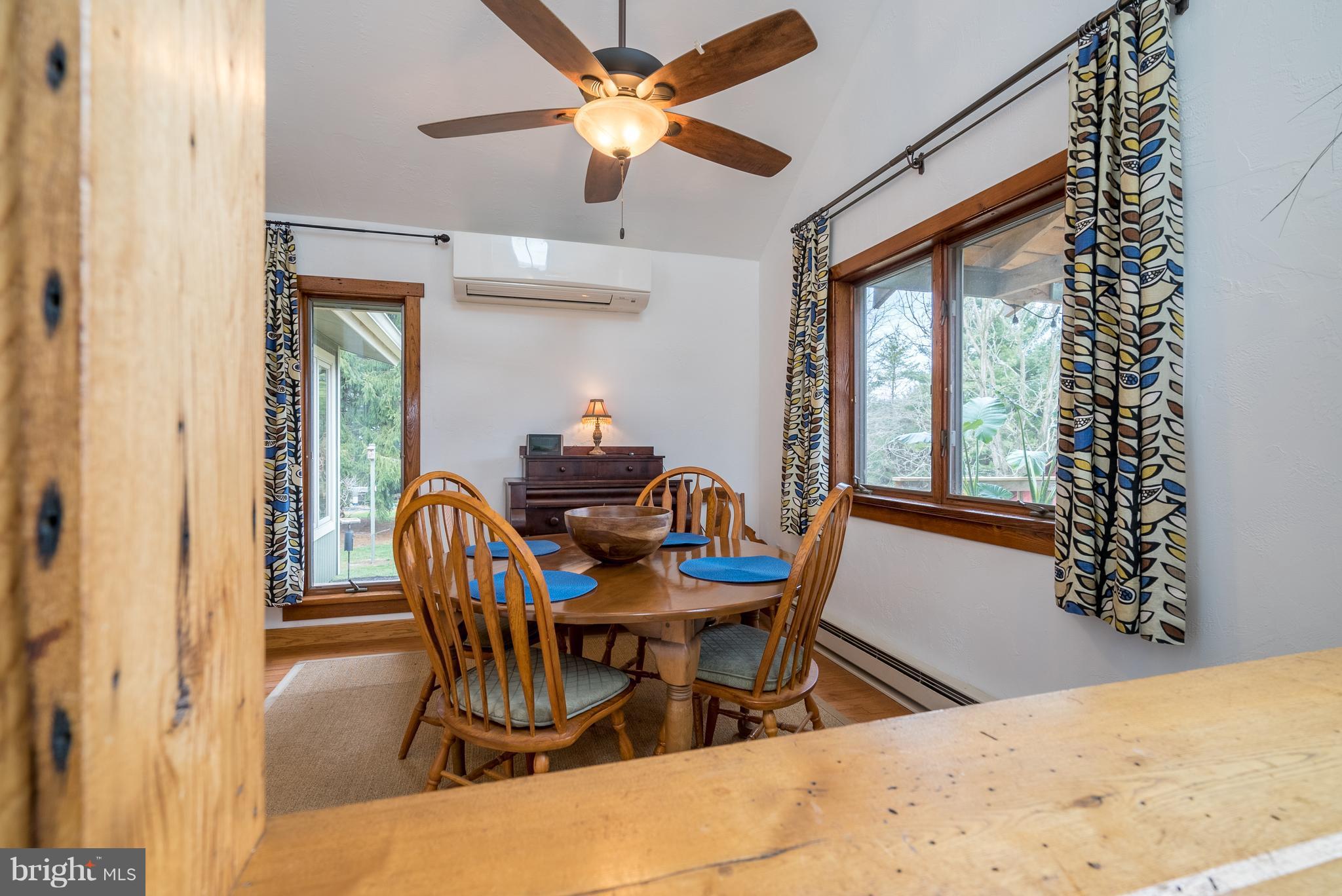11850 Beaver Dam Road Union Bridge, MD 21791 - Photo 11 of 30 a view of a dining room with furniture window and wooden floor