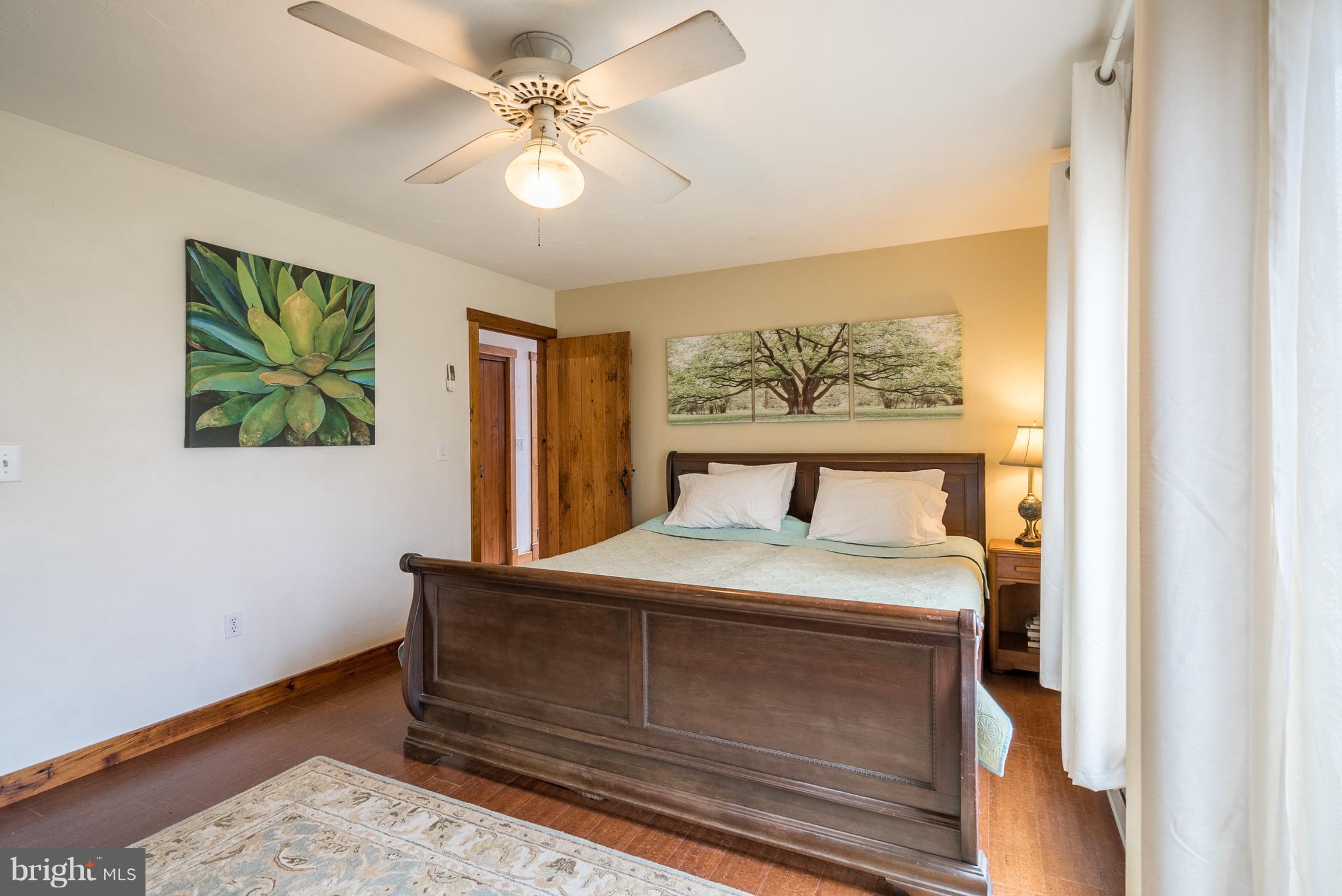 11850 Beaver Dam Road Union Bridge, MD 21791 - Photo 13 of 30 a bedroom with a bed and a window