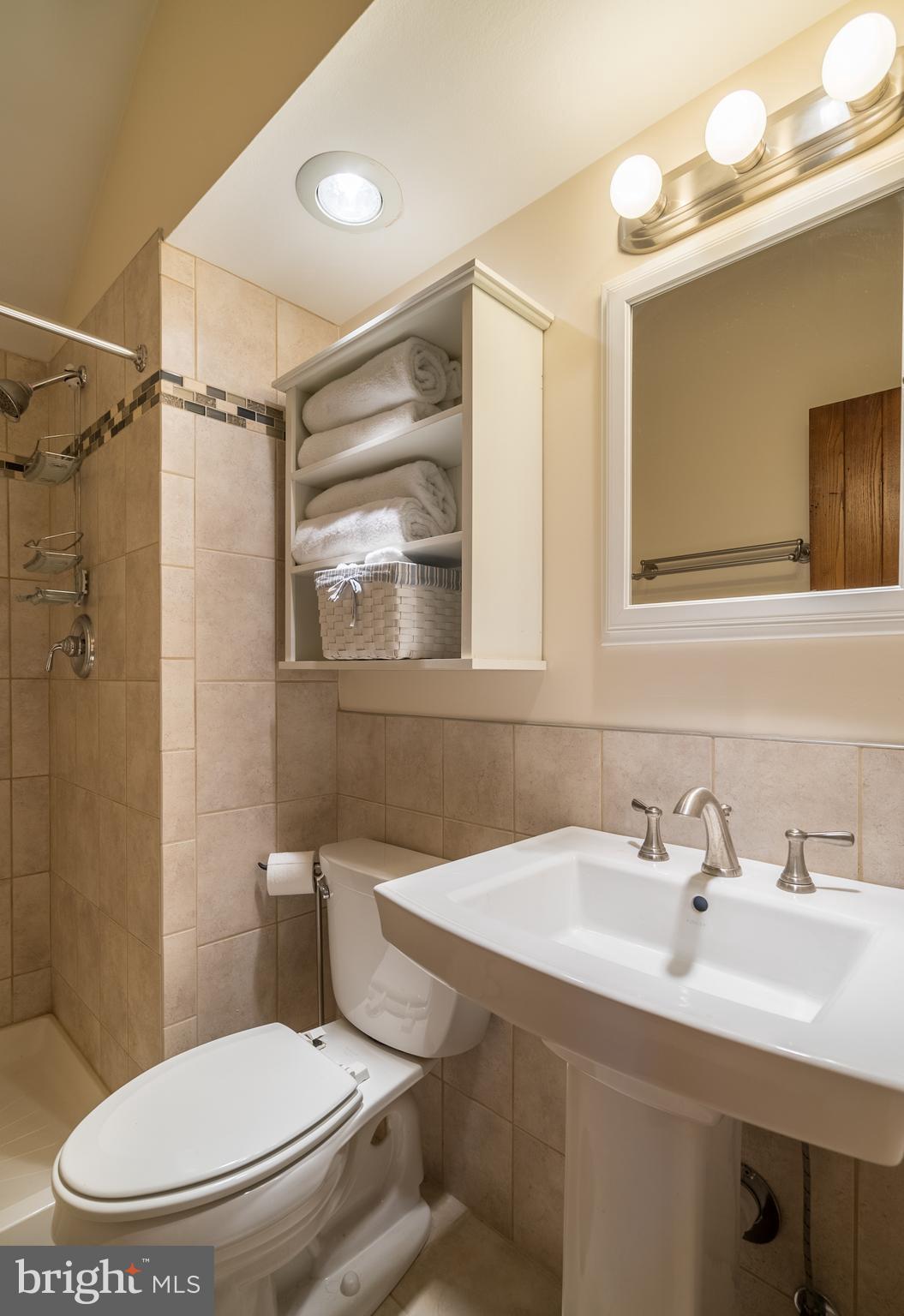 11850 Beaver Dam Road Union Bridge, MD 21791 - Photo 19 of 30 a bathroom with a sink toilet and shower