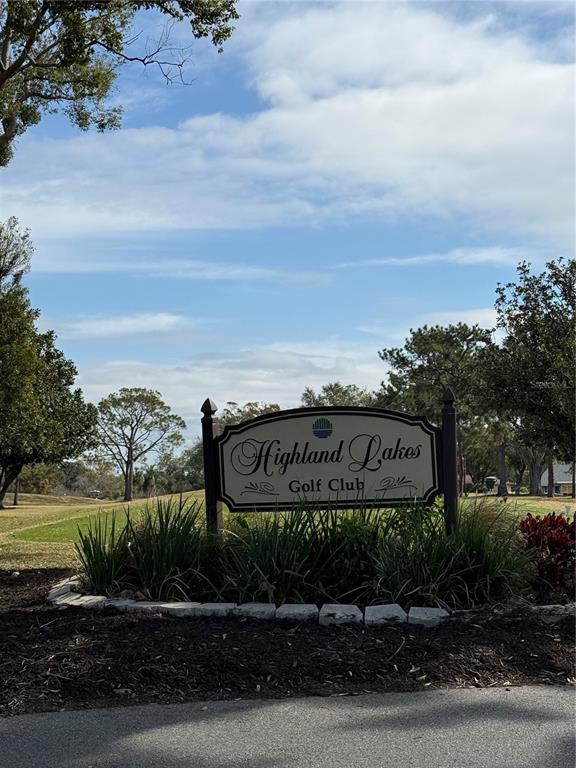 3115 Mission Grove Drive Palm Harbor, FL 34684 - Photo 2 of 13 a view of a park with a sign board