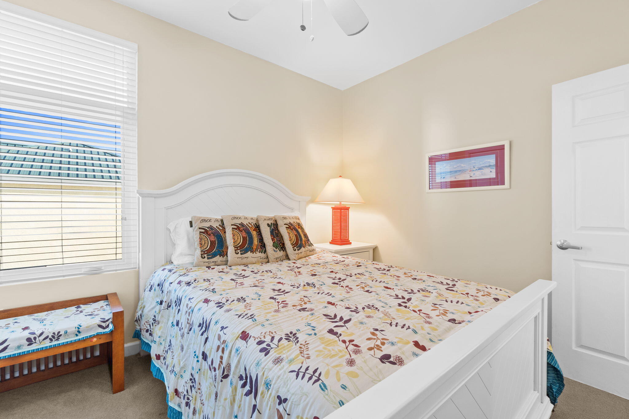 12011 Front Beach Road, Unit 201C Panama City Beach, FL 32407 - Photo 23 of 42 a bedroom with a bed and a window