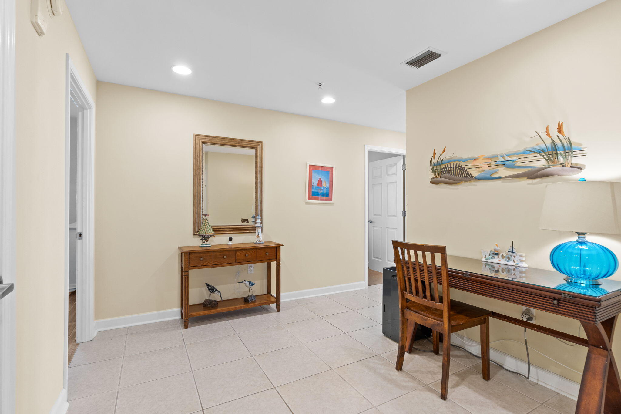 12011 Front Beach Road, Unit 201C Panama City Beach, FL 32407 - Photo 25 of 42 a room with furniture and piano table