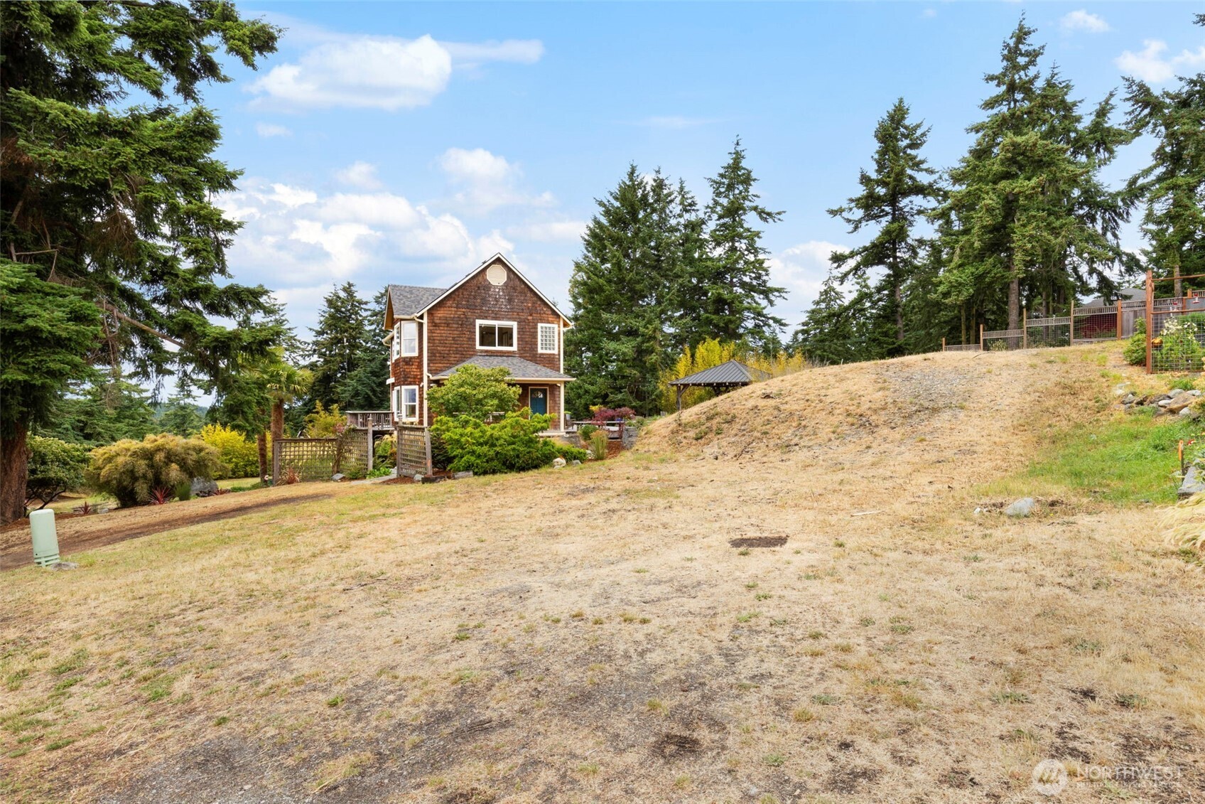 9999 P Street Port Townsend, WA 98368 - Photo 4 of 25 a view of a house with a yard