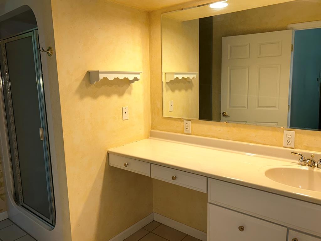 114 Oak Ridge Drive Clarion, PA 16214 - Photo 23 of 38 a bathroom with a sink and a mirror