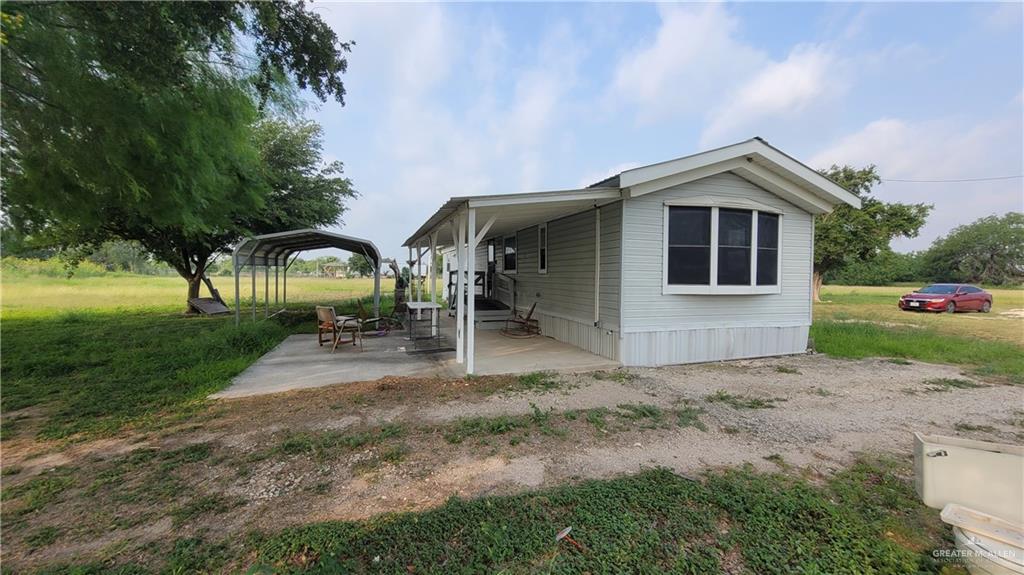 4716 East Wisconsin Road, Unit A Edinburg, TX 78542 - Photo 1 of 1 View of home's exterior featuring a yard