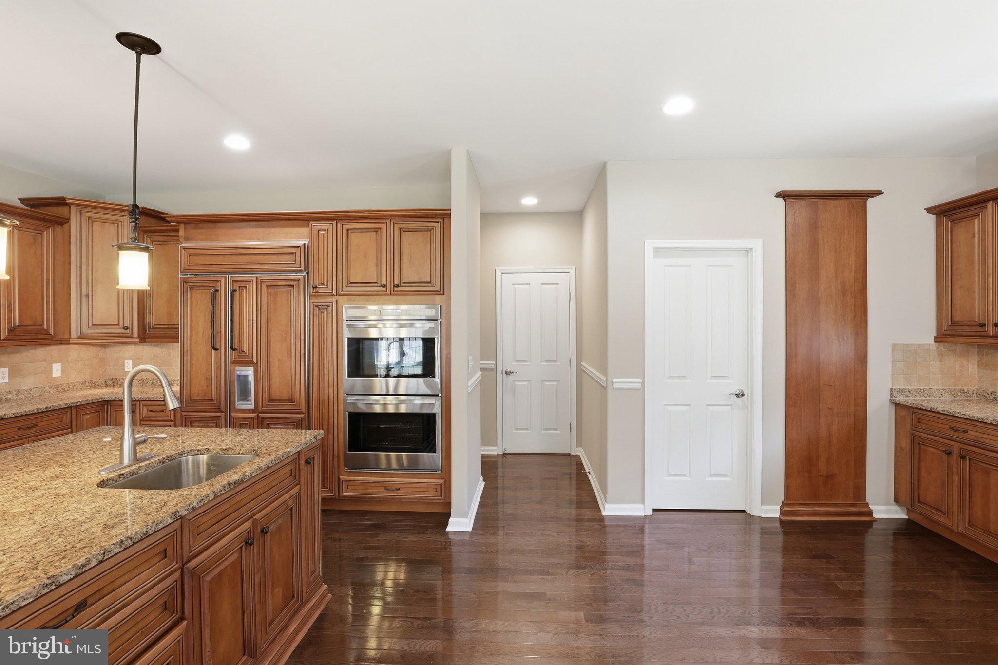 16932 Fitzgeralds Road Lincoln, DE 19960 - Photo 60 of 103 Elegant kitchen with rich wood tones.