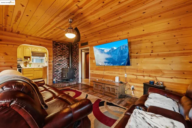 a spacious bathroom with a sink a mirror and a bathtub