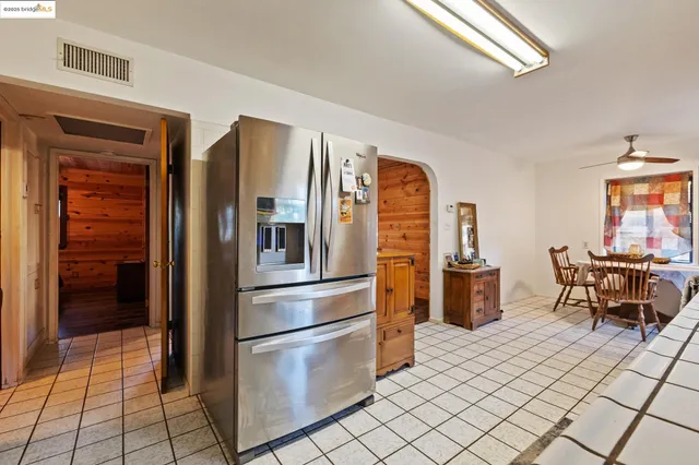 a kitchen that has a sink and a stove