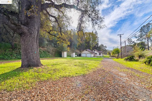 a view of a swimming pool with an outdoor space and seating area