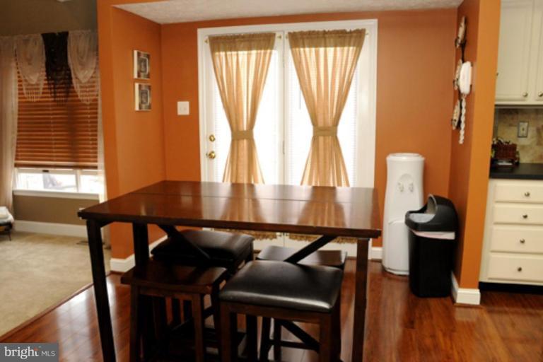 819 Sunny Chapel Road Odenton, MD 21113 - Photo 14 of 26 a dining room with furniture and window