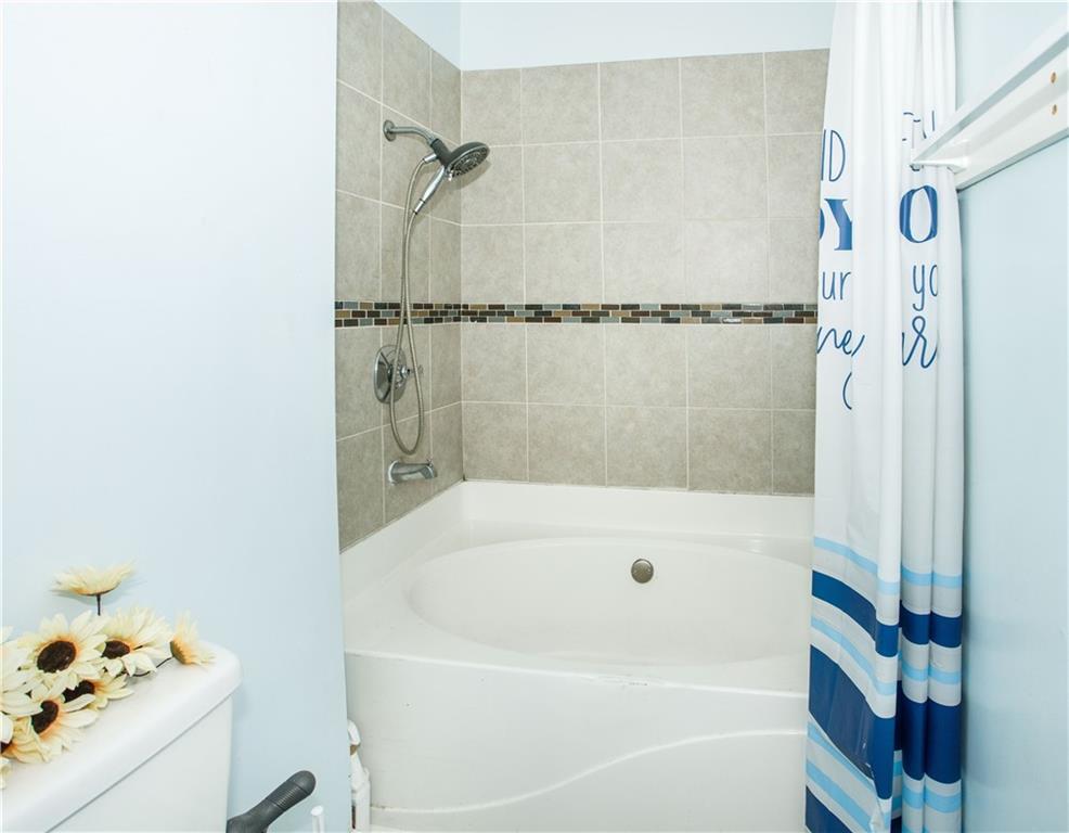 3831 Fairmont Avenue Macon, GA 31204 - Photo 17 of 29 a bathroom with a bathtub and shower