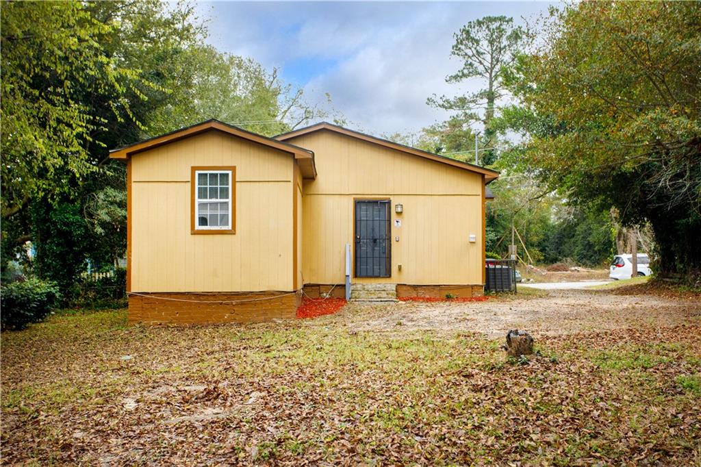 3831 Fairmont Avenue Macon, GA 31204 - Photo 26 of 29 a view of backyard of house with green space
