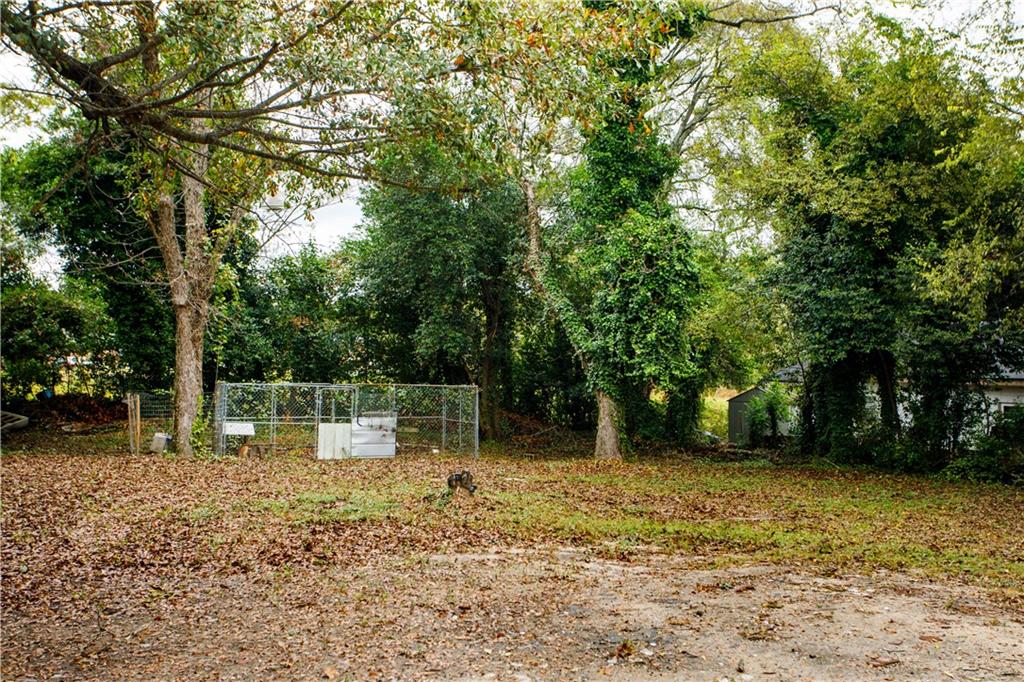3831 Fairmont Avenue Macon, GA 31204 - Photo 29 of 29 a backyard of a house with lots of green space