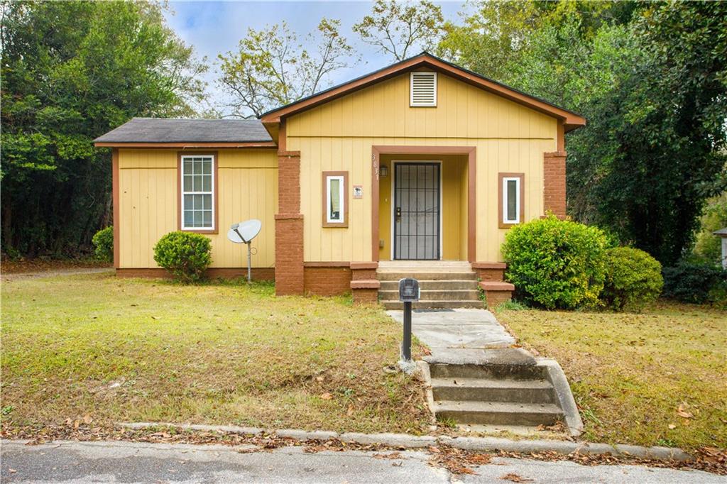 3831 Fairmont Avenue Macon, GA 31204 - Photo 4 of 29 a front view of a house with garden