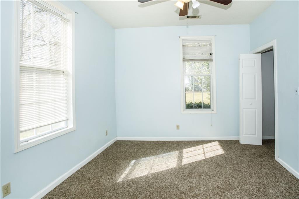 3831 Fairmont Avenue Macon, GA 31204 - Photo 10 of 29 an empty room with windows and closet