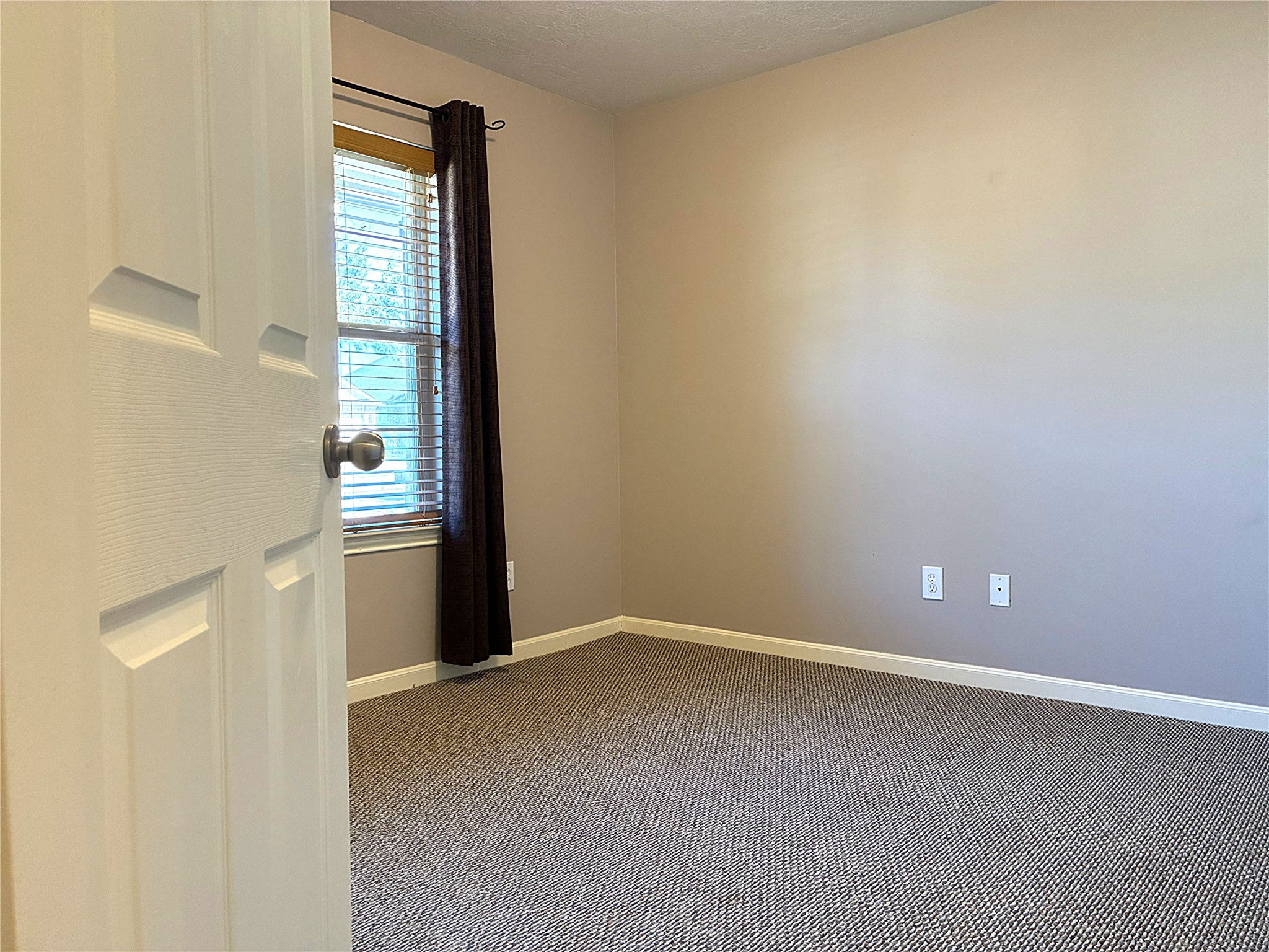 3418 Cypress Landing Court Rosenberg, TX 77471 - Photo 5 of 23 a view of an empty room and a window