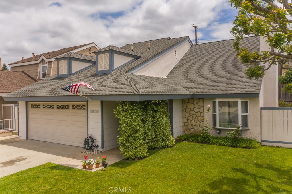 23522 Swallow Lane Lake Forest, CA 92630 - Photo 1 of 1 front view of a house with a yard