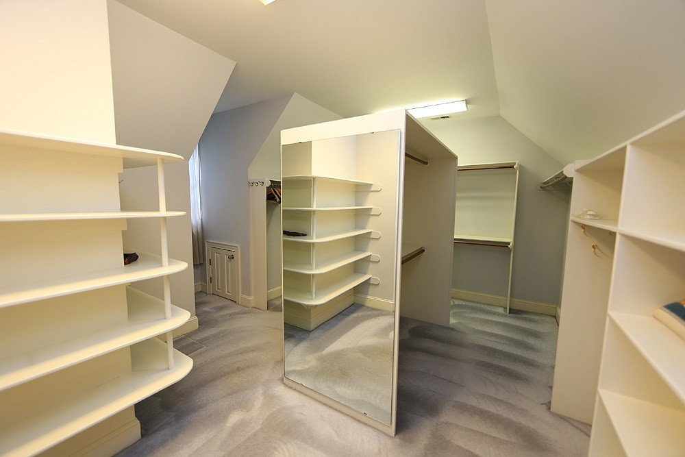 8617 Cold Springs Road Raleigh, NC 27615 - Photo 21 of 30 This closet is really large, well designed and has storage in the eaves. Master Closet