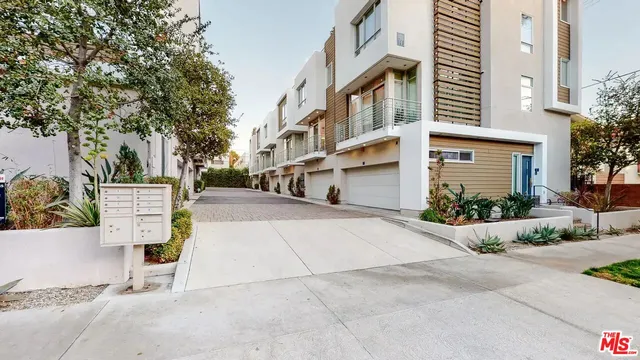 a view of street with large building