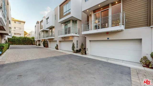 a view of a building with a street