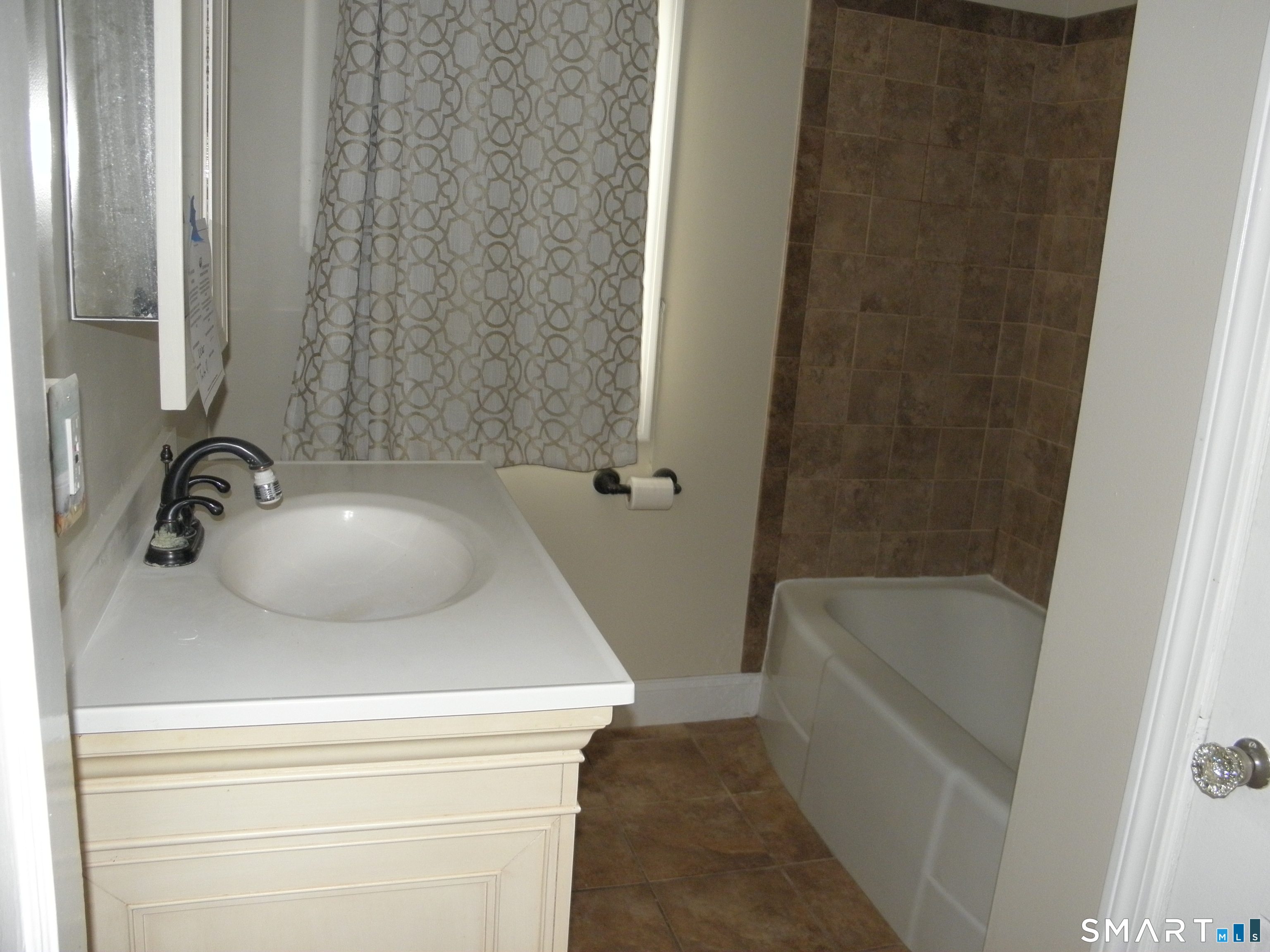 32 Walnut Circle Windsor Locks, CT 06096 - Photo 8 of 11 a bathroom with a sink and a bathtub