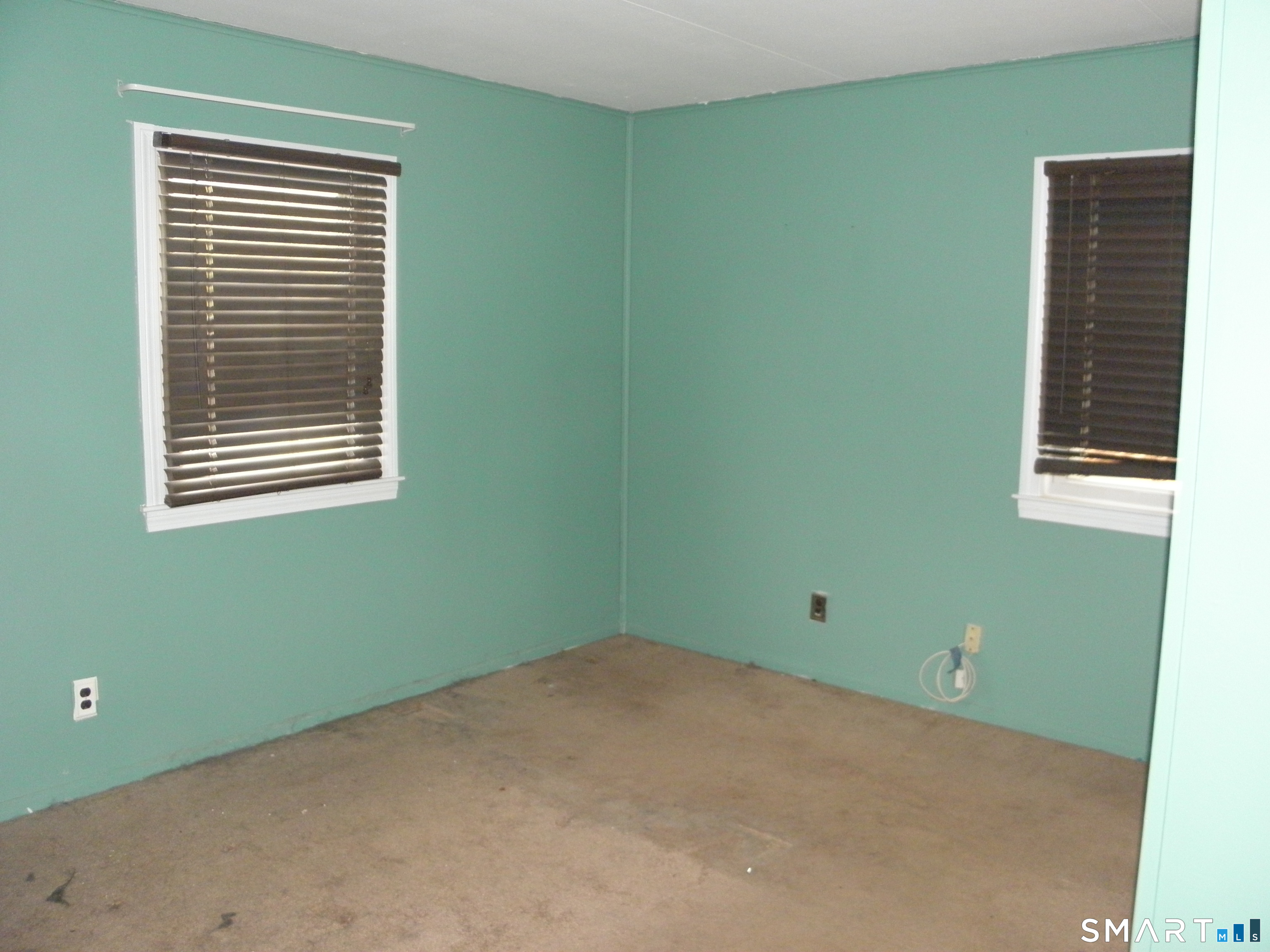 32 Walnut Circle Windsor Locks, CT 06096 - Photo 10 of 11 a view of a room that has a window in it