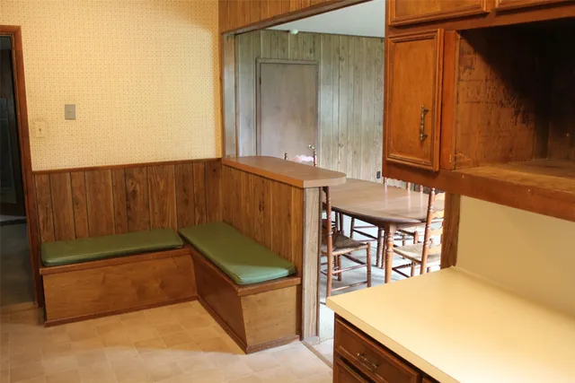 a room with furniture and a window