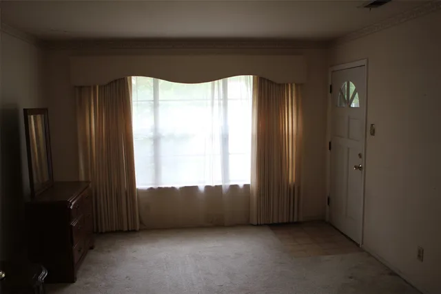 an empty room with windows