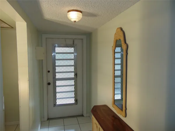 a view of a room that has a window in it