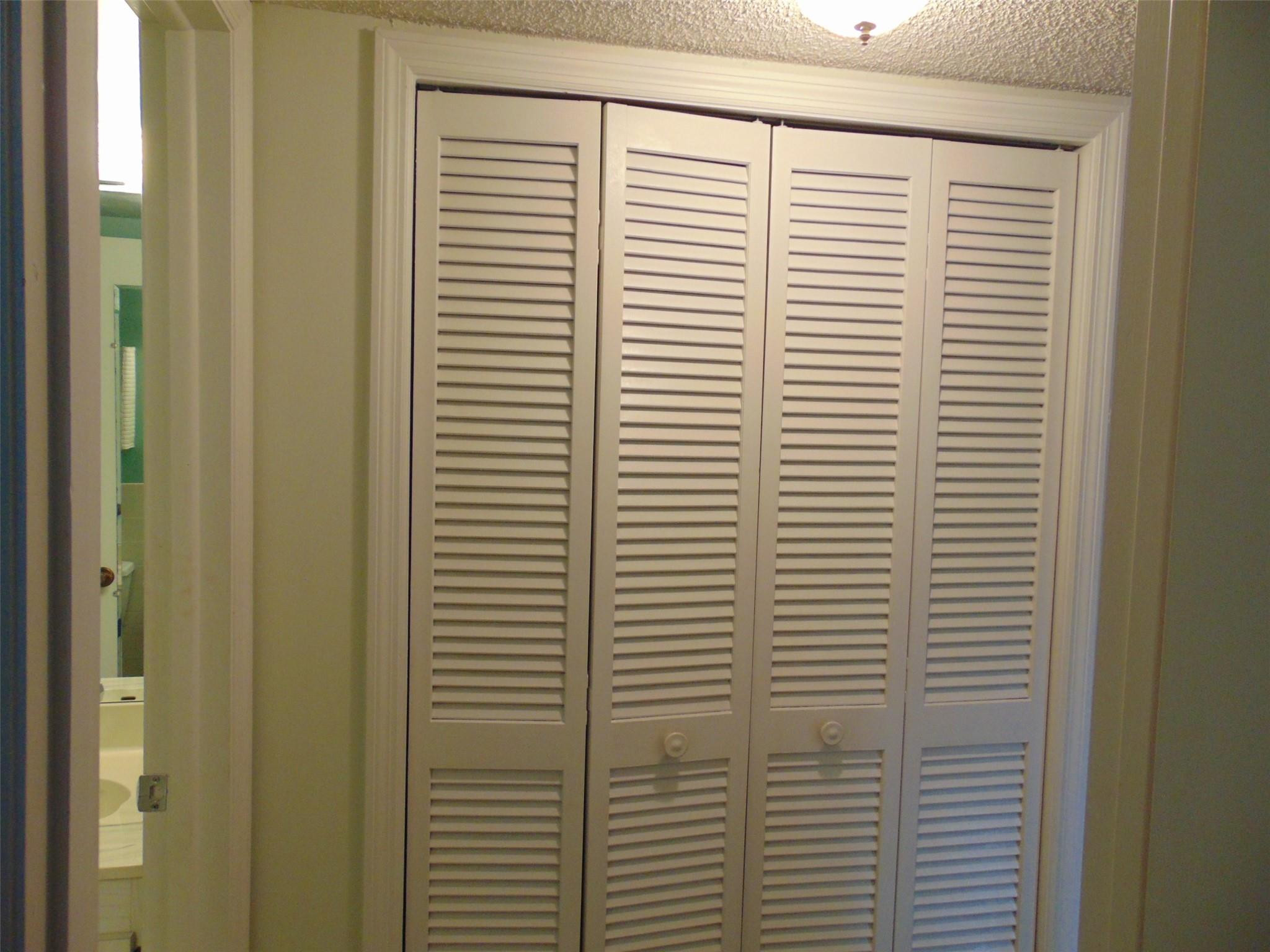 9788 Marina Boulevard, Unit 313 Boca Raton, FL 33428 - Photo 8 of 65 HALLWAY CLOSET AT GUEST BATH