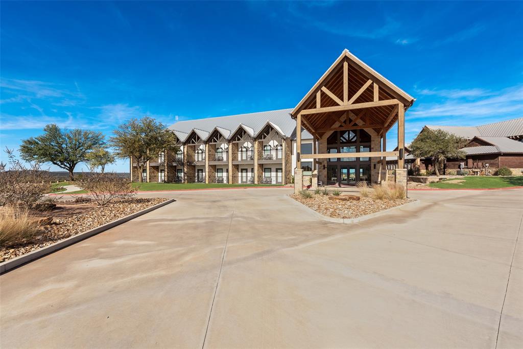 50 Jupiter Drive Graford, TX 76449 - Photo 12 of 14 a front view of a house with a yard