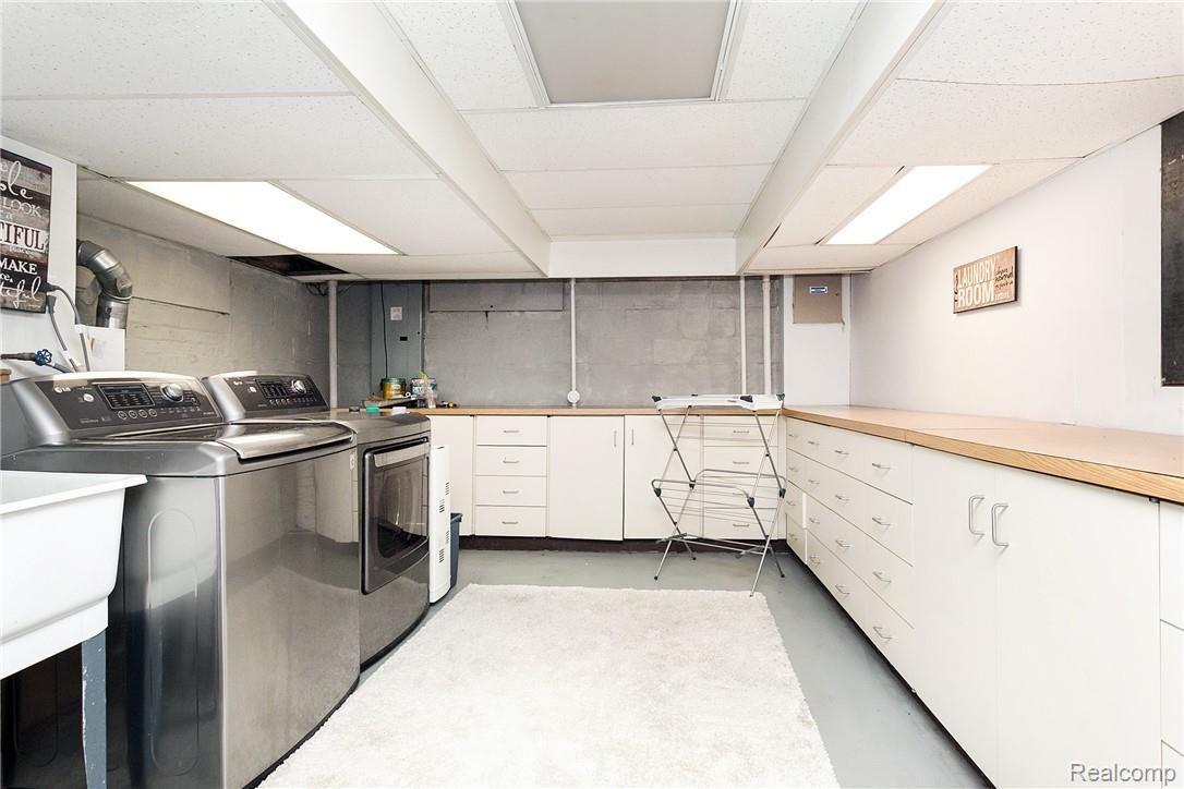 1179 East Maple Road Birmingham, MI 48009 - Photo 28 of 30 Large Lower Level Laundry Room
