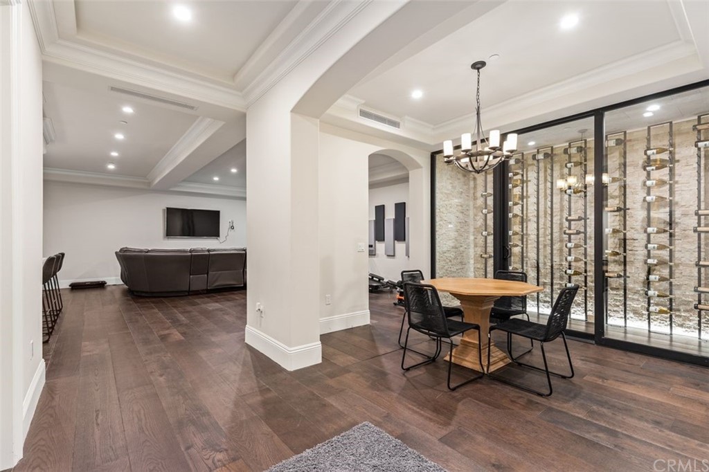 19 Alexa Lane Ladera Ranch, CA 92694 - Photo 13 of 40 a living room with furniture and a chandelier